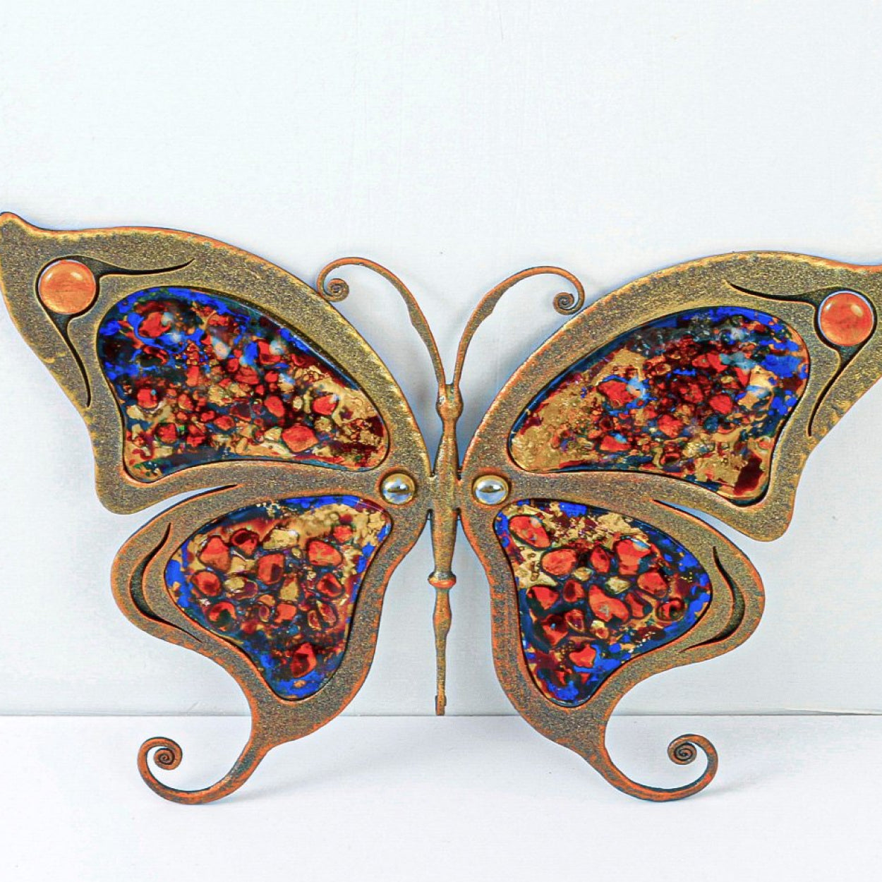Unikalna rozeta kuta motyl z kolorowym szkłem - do bram ogrodzeń bralustrad