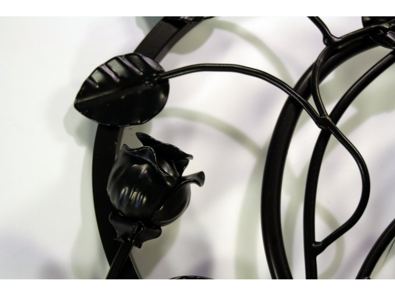 Rozeta z różą kuta ze stali z różą. Do balustrad, bram, ogrodzeń.